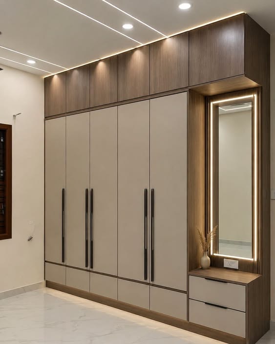 Custom cupboards with modern wood finishes by Lithisha Interiors
