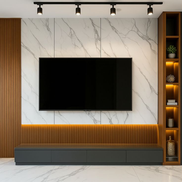 Marble wall paneling and fluted wood TV console with integrated ceiling track lights